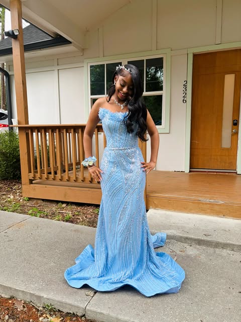 Powder blue embellished gown with a flowing train